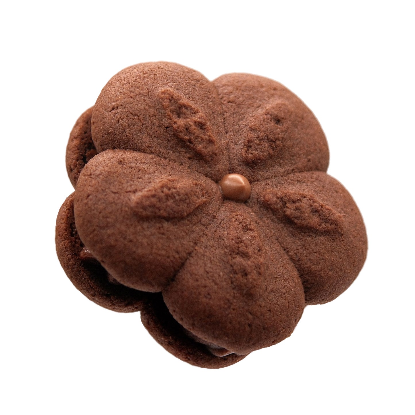 Side view of rich chocolate cookie filled with silky milk chocolate ganache center