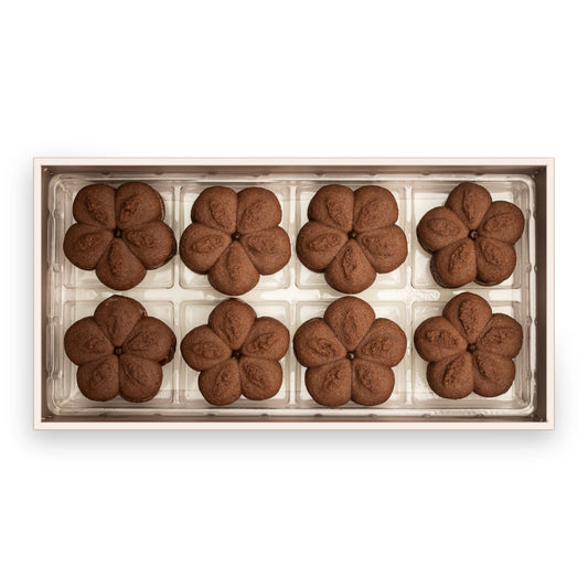 Box of eight rich, handcrafted chocolate cookies, beautifully arranged and ready for gifting or indulgence.