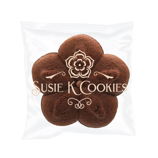 Double chocolate cookie sandwich in elegant Susie K Cookies packaging with blush branding